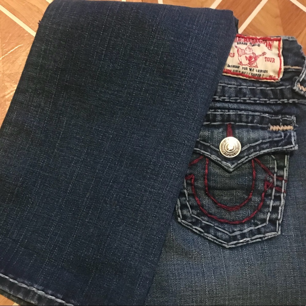 A pair of boot cut jeans